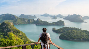 Traveler admiring the scenery over the ocean